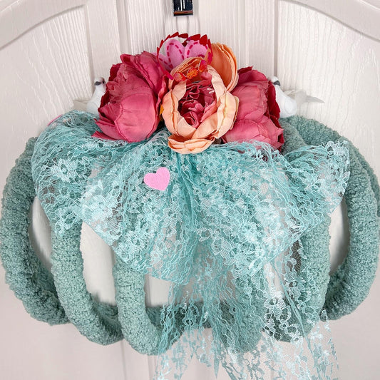 Romantic wreath with flowers and birds