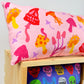 Halloween throw pillows “Mushrooms in pink”